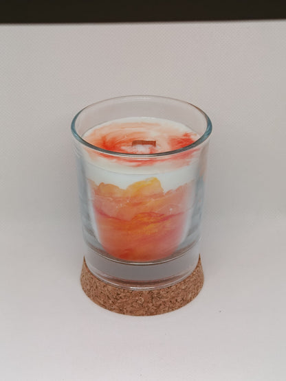 Vela aromática marmoleada en vaso