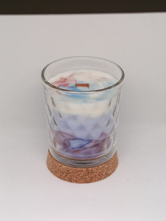 Vela aromática marmoleada en vaso