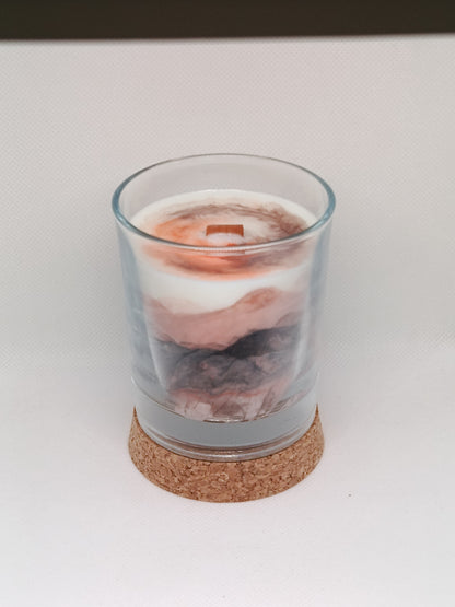 Vela aromática marmoleada en vaso