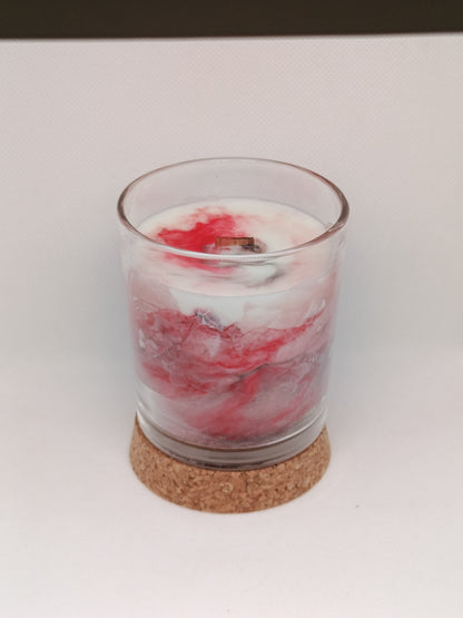 Vela aromática marmoleada en vaso